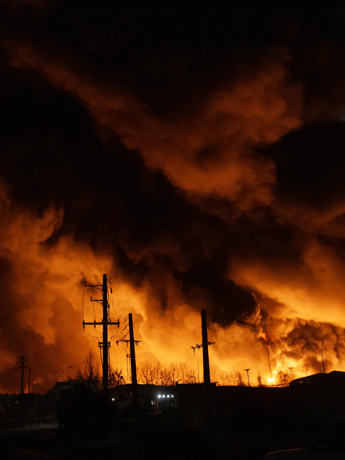 TEHRAN, IRAN - MARCH 8: Fire breaks out at the Shahran oil depot after US and Israeli attacks, leaving numerous fuel tankers and vehicles in the area unusable in Tehran, Iran on March 8, 2026. Hassan Ghaedi / Anadolu