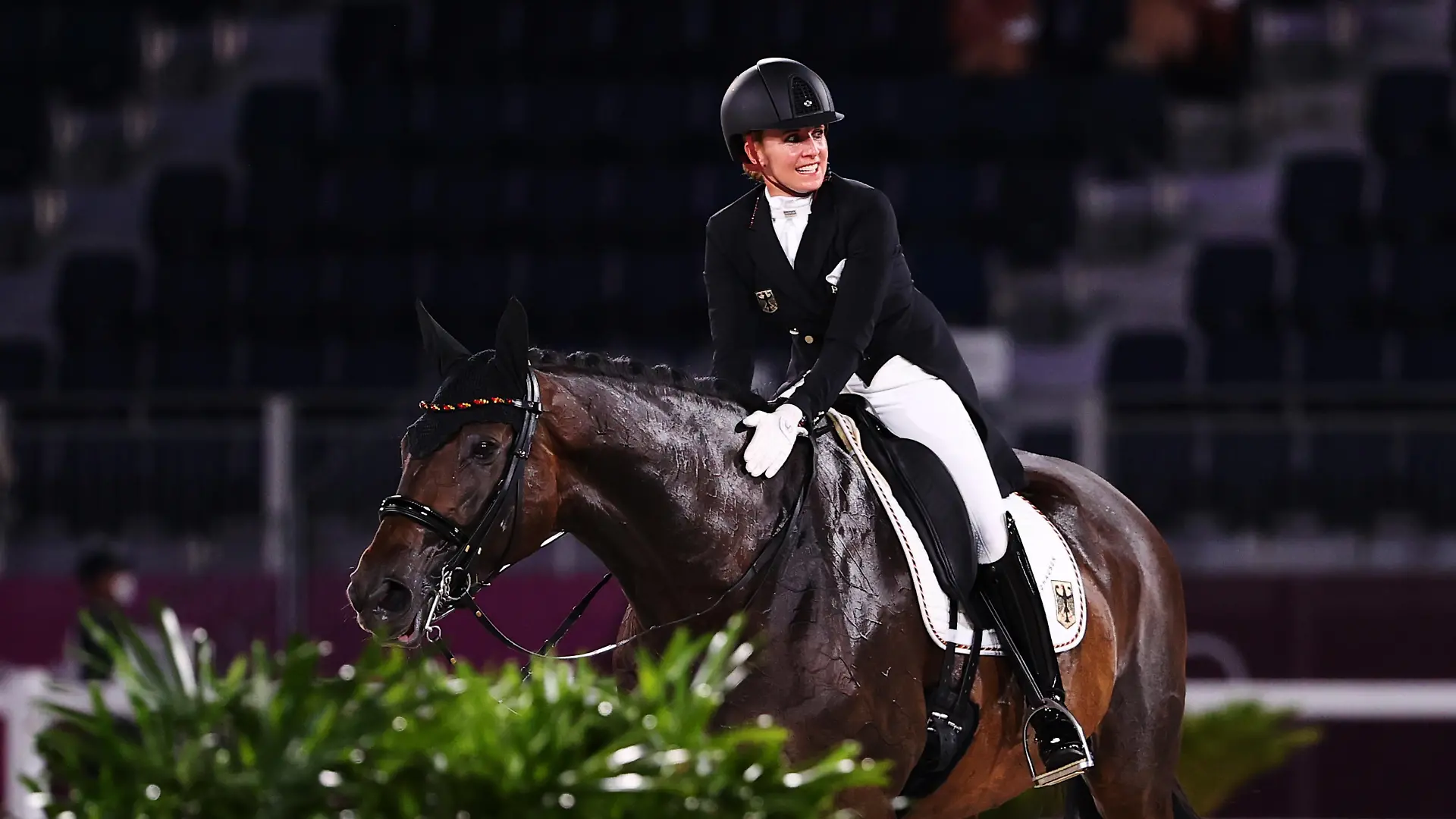 Tokyo 2020 Olympics - Dressage - Individual - Grand Prix - Day 1 - Groups A/B/C - Equestrian Park - Tokyo, Japan - July 24, 2021. Jessica von Bredow-Werndl of Germany on her horse TSF Dalera reacts after competing. REUTERS/Alkis Konstantinidis