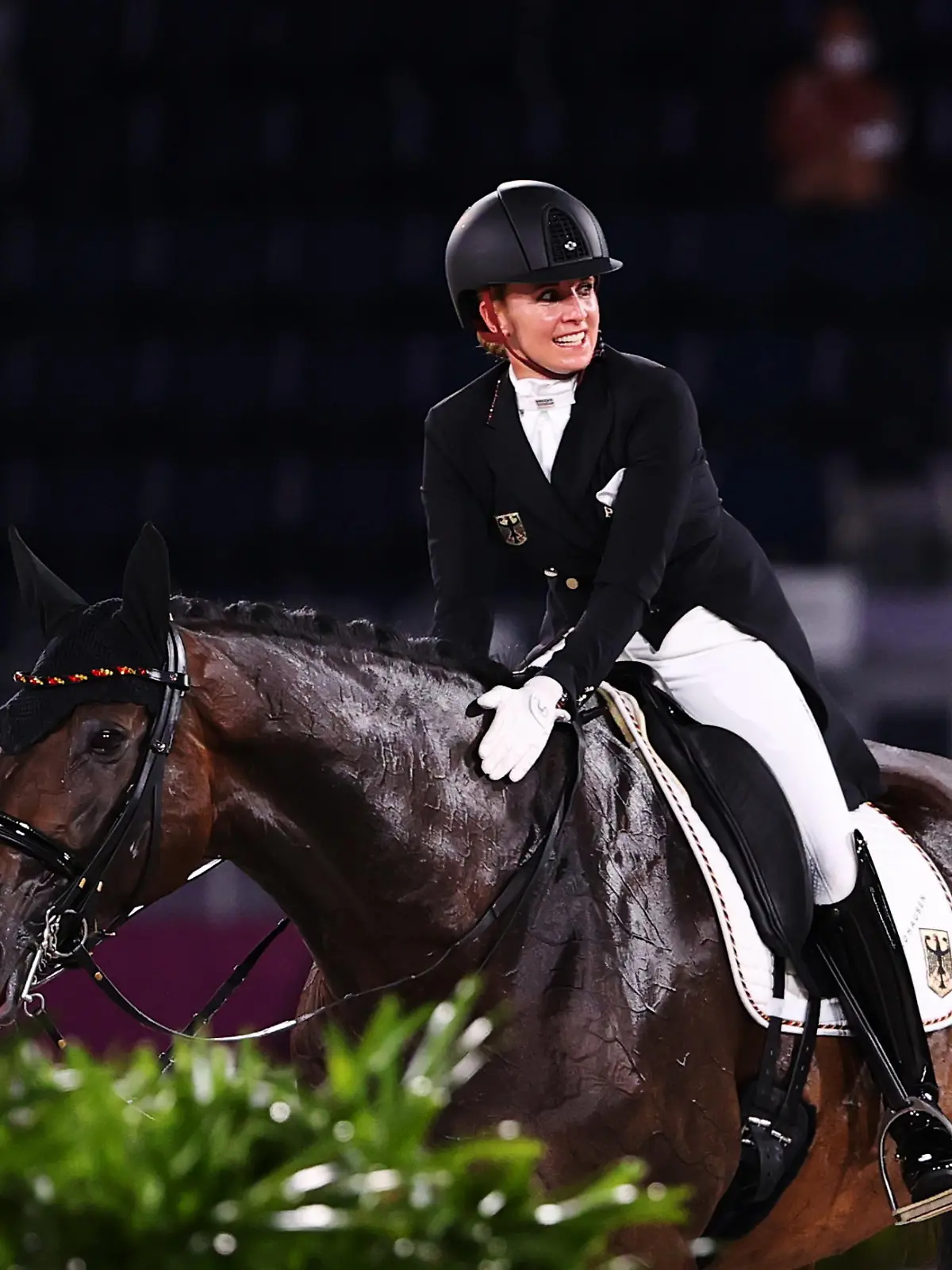 Tokyo 2020 Olympics - Dressage - Individual - Grand Prix - Day 1 - Groups A/B/C - Equestrian Park - Tokyo, Japan - July 24, 2021. Jessica von Bredow-Werndl of Germany on her horse TSF Dalera reacts after competing. REUTERS/Alkis Konstantinidis