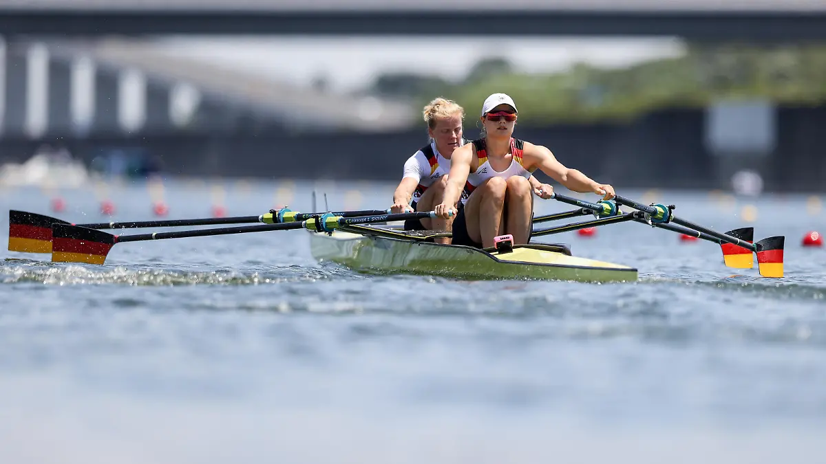 TOKYO, JAPAN - JULY 23: Annekatrin Thiele and Leonie Menzel of Team Germany compete during the Women’s Double Sculls Heat 3 on Day 0 of the Tokyo 2020 Olympic Games at Sea Forest Waterway on July 23, 2021 in Tokyo, Japan. (Photo by Naomi Baker/Getty Images)