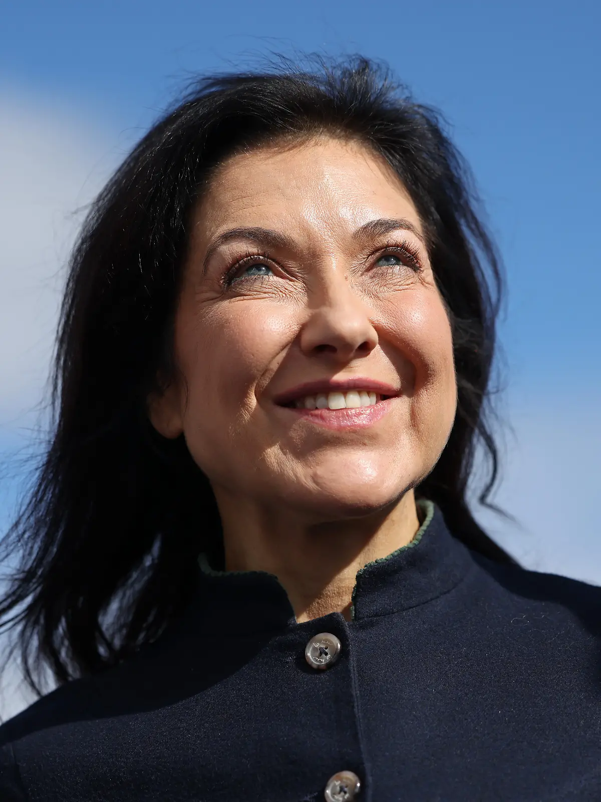 MEMMINGEN, GERMANY - MARCH 12: Economy Minister Katherina Reiche arrives for the inauguration of the new Heizwerk Memmingen-Benningen heating plant on March 12, 2026 in Memmingen, Germany. The new heating plant is among the first to be funded through the government's BEW grant program for a high-efficiency heating network. The Memmingen-Benningen plant combines a a wood chip furnace with local renewable sources, including a nearby solar energy park, that authorities claim will save an annual 6,000 tons in CO2 emissions compared to burning natural gas. (Photo by Sean Gallup/Getty Images)