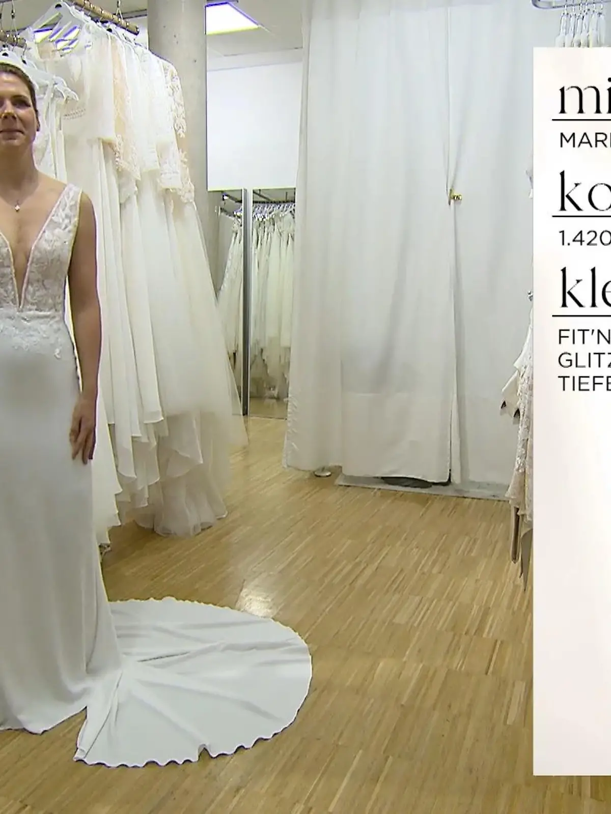 Bild zu: "Traumkleid mit tiefem Ausschnitt gefunden"