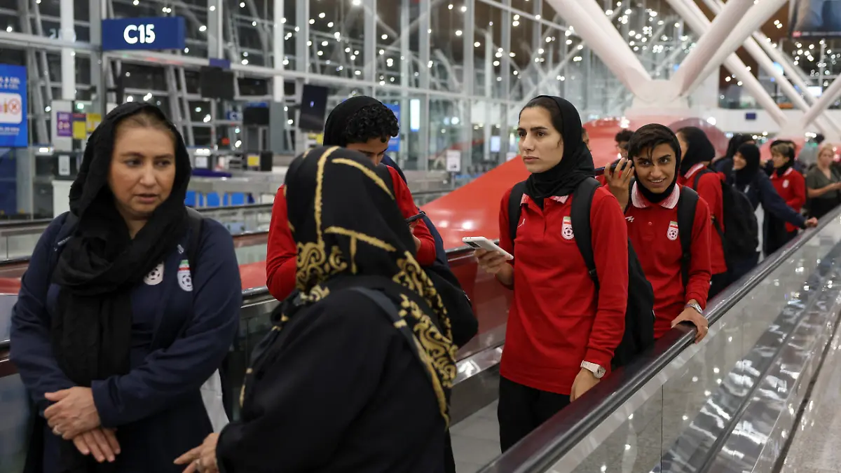Members of the Iranian women's national soccer team arrive at Terminal 1 of Kuala Lumpur International Airport after attending a match in Group A of the AFC Women's Asian Cup in Australia, at Sepang, Malaysia, March 11, 2026. REUTERS/Hasnoor Hussain