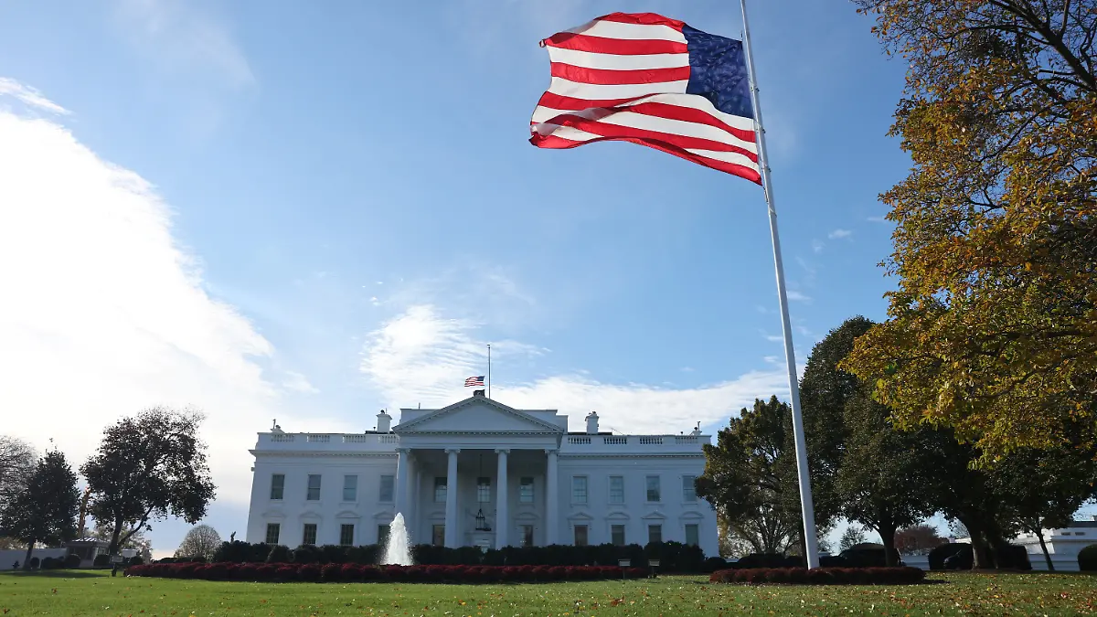 A large American flag flies on the north lawn of the White House in Washington, D.C., U.S. November 11, 2025. REUTERS/Chris Helgren