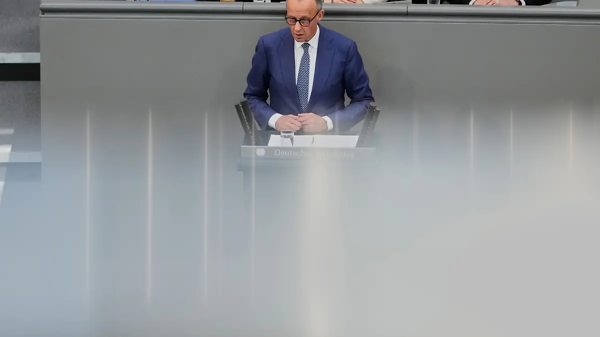 German Chancellor Friedrich Merz delivers a statement during a session of the German parliament in Berlin, Germany, Wednesday, March 18, 2026. (AP Photo/Markus Schreiber)