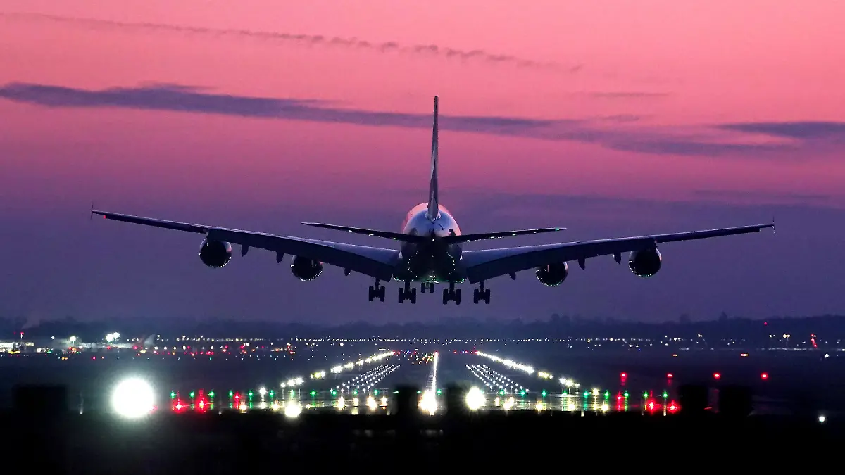 Gatwick Airport expansion. An Emirates Airbus A380 lands during sunrise at London Gatwick Airport in Crawley, West Sussex. Gatwick wants to bring its second, emergency runway into routine use for take-offs by smaller aircraft, increasing the airport's annual flight capacity by 100,000. Opponents of the expansion have accused the airport of trying to open "a new runway on the cheap". Picture date: Monday February 17, 2025. See PA story AIR Gatwick. Photo credit should read: Gareth Fuller/PA Wire URN:79098135