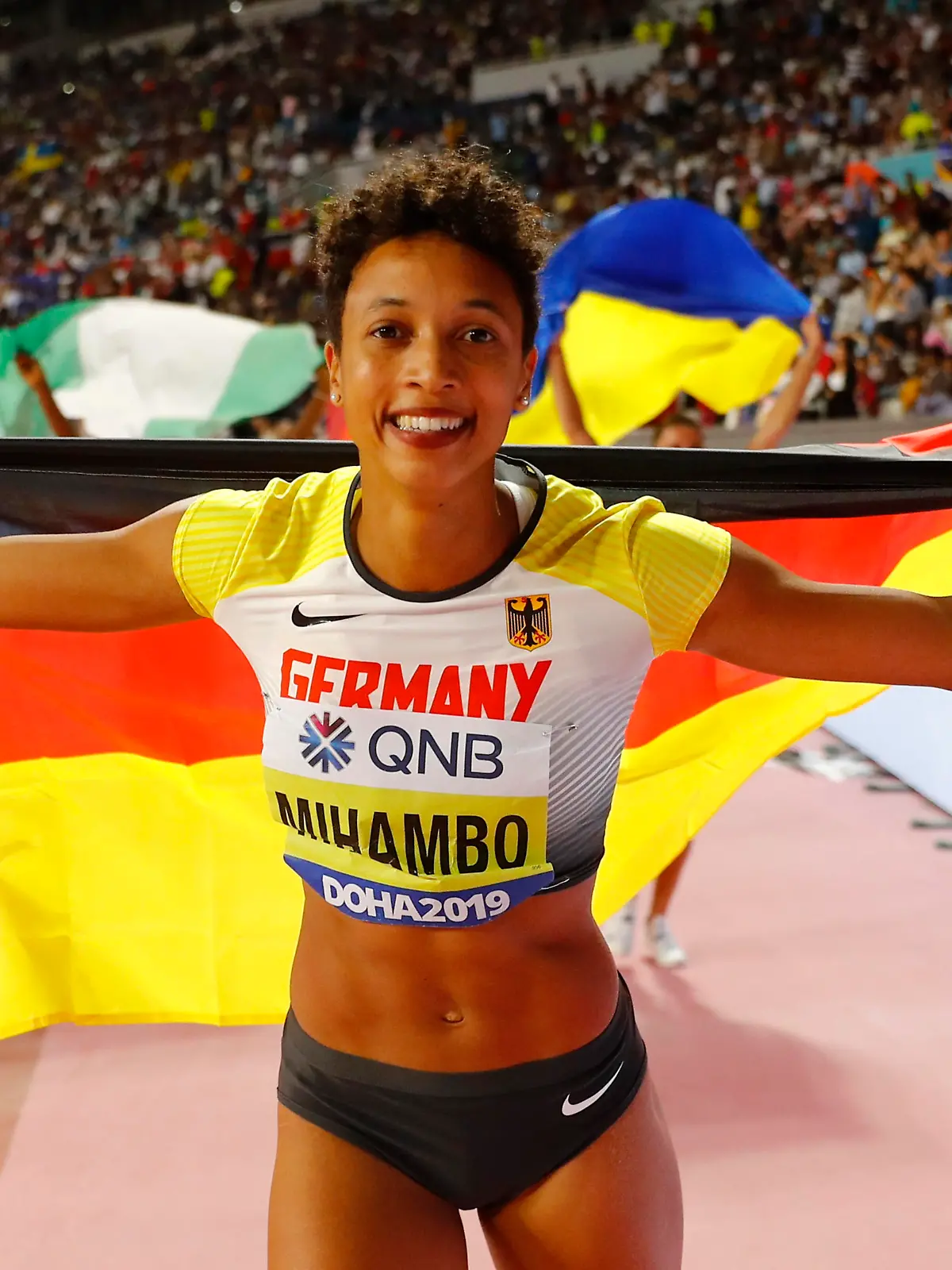 Athletics - World Athletics Championships - Doha 2019 - Women's Long Jump Final - Khalifa International Stadium, Doha, Qatar - October 6, 2019 Germany's Malaika Mihambo celebrates winning gold REUTERS/Kai Pfaffenbach