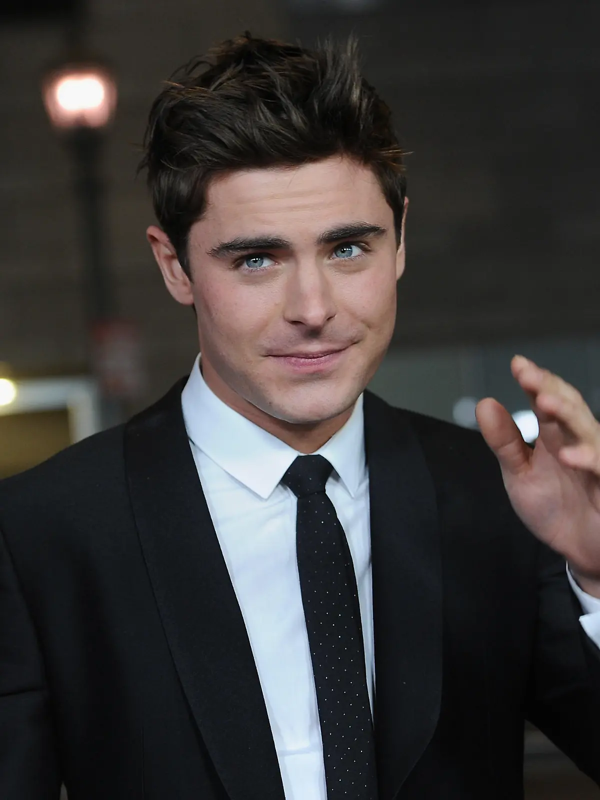 LOS ANGELES, CA - JANUARY 27:  Actor Zac Efron arrives to the premiere of Focus Features' "That Awkward Moment" at Regal Cinemas L.A. Live on January 27, 2014 in Los Angeles, California.  (Photo by Alberto E. Rodriguez/Getty Images)