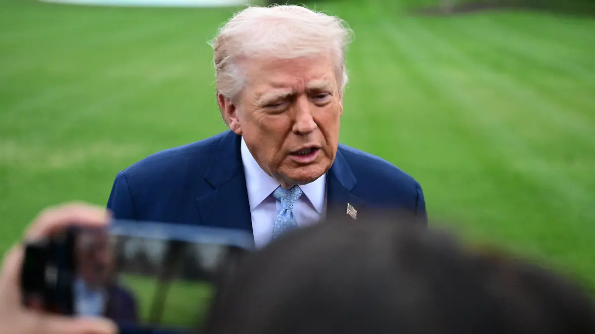 U.S. President Donald J. Trump speaks to reporters about the Strait of Hormuz, Iran, the death of Chuck Norris, and other news of the day while accompanied by United States Secretary of State Marco Rubio prior to departing on the South Lawn of the White House in Washington, D.C., on March 20, 2026. (Photo by Kyle Mazza/NurPhoto)