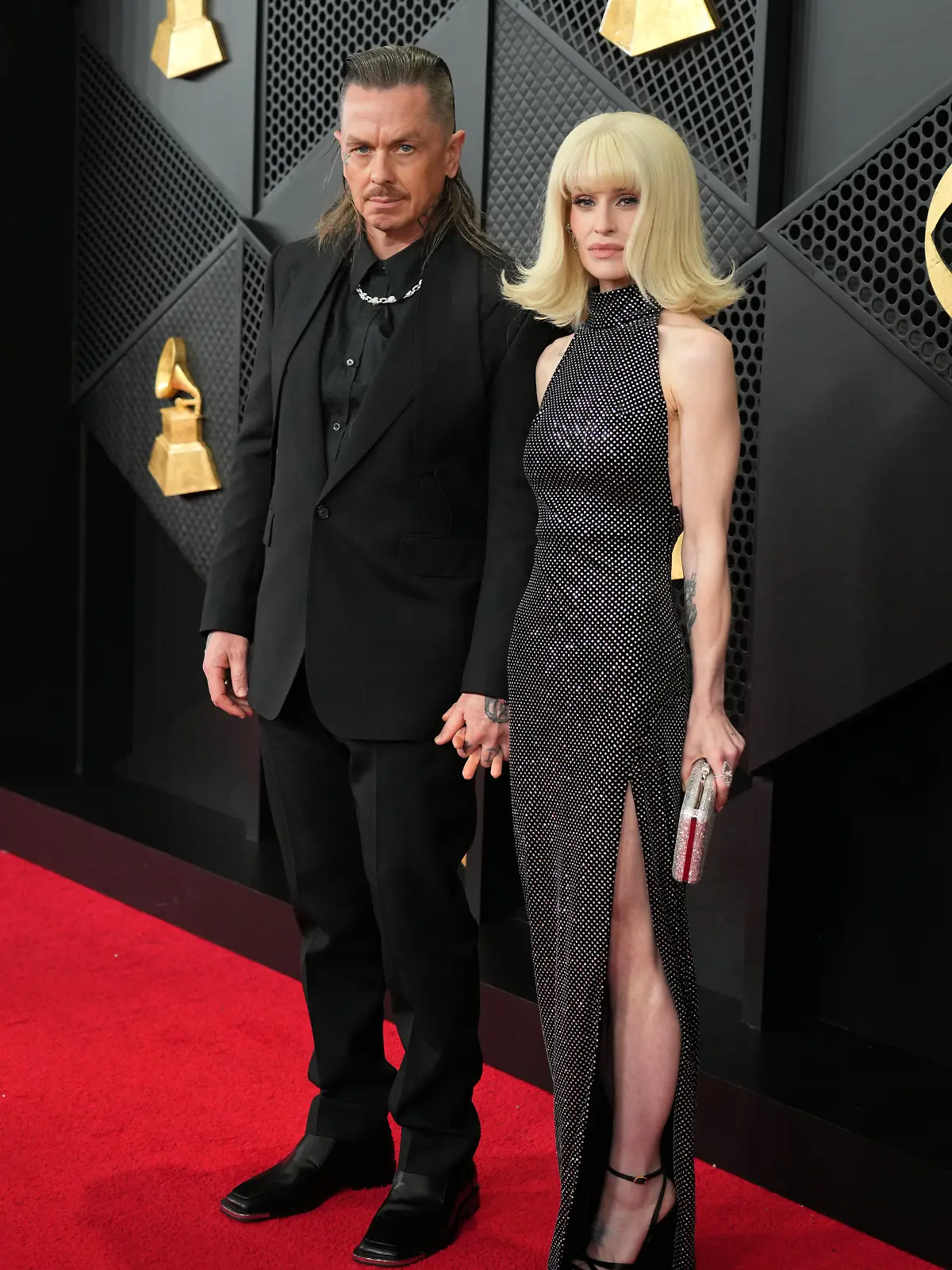 Sid Wilson, left, and Kelly Osbourne arrive at the 68th annual Grammy Awards on Sunday, Feb. 1, 2026, in Los Angeles. (Photo by Jordan Strauss/Invision/AP)