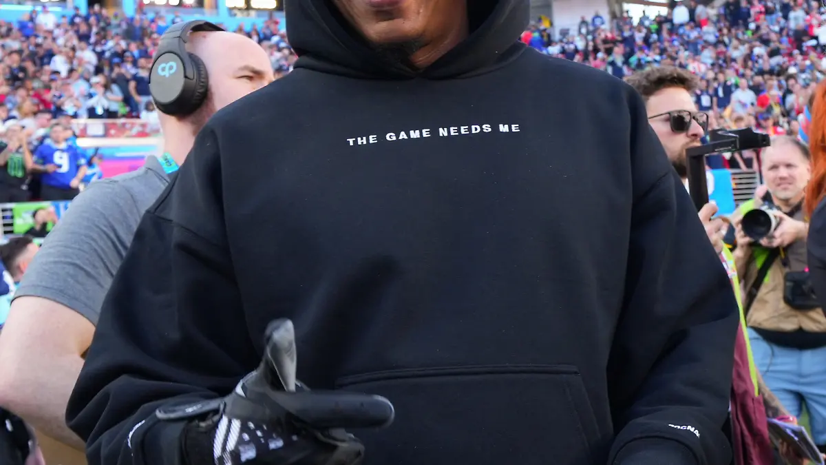 Jay-Z walks on the field before the NFL Super Bowl 60 football game between the New England Patriots and the Seattle Seahawks, Sunday, Feb. 8, 2026, in Santa Clara, Calif. (AP Photo/Julio Cortez)