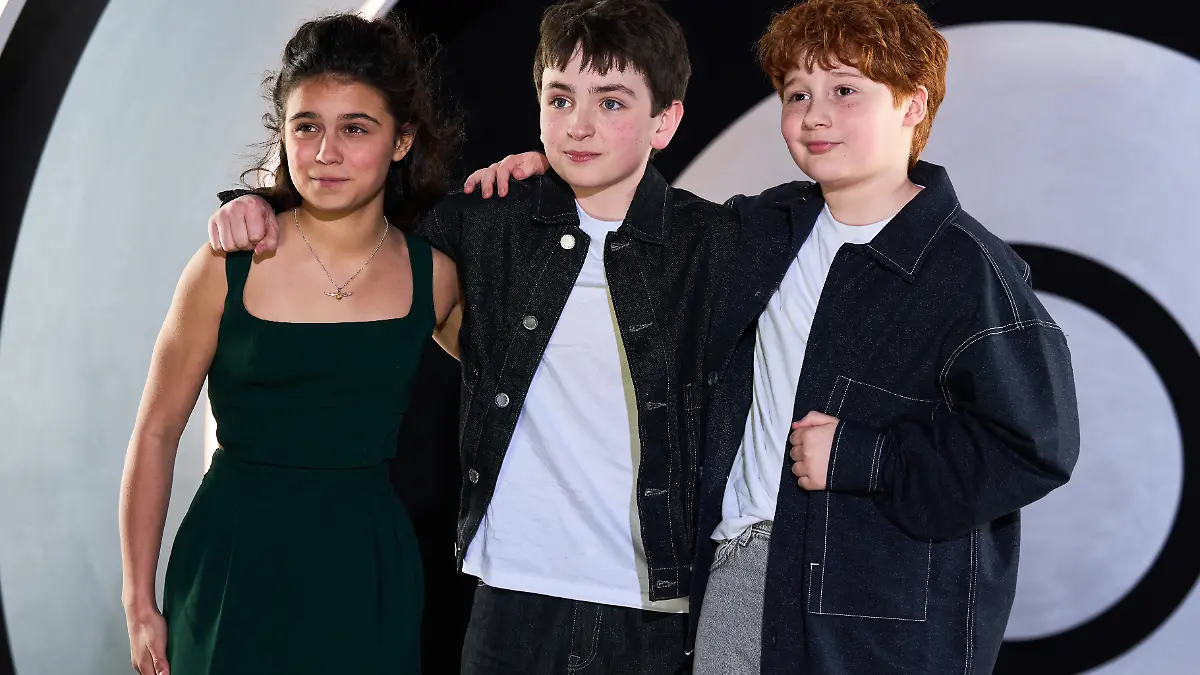 Arabella Stanton, Dominic McLaughlin and Alastair Stout pose for photographers upon arrival at the HBO Max Launch Party in London, England, Wednesday, March 25, 2026. (Photo by Scott A Garfitt/Invision/AP)