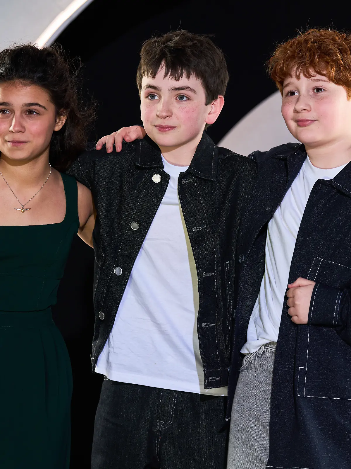 Arabella Stanton, Dominic McLaughlin and Alastair Stout pose for photographers upon arrival at the HBO Max Launch Party in London, England, Wednesday, March 25, 2026. (Photo by Scott A Garfitt/Invision/AP)