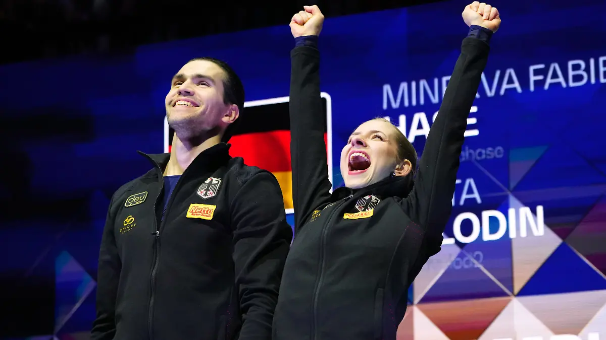 Minerva Fabienne Hase and Nikita Volodin of Germany celebrate after performing during the pairs free skating at the Figure Skating World Championships in Prague, Czech Republic, Thursday, March 26, 2026. (AP Photo/Petr David Josek)