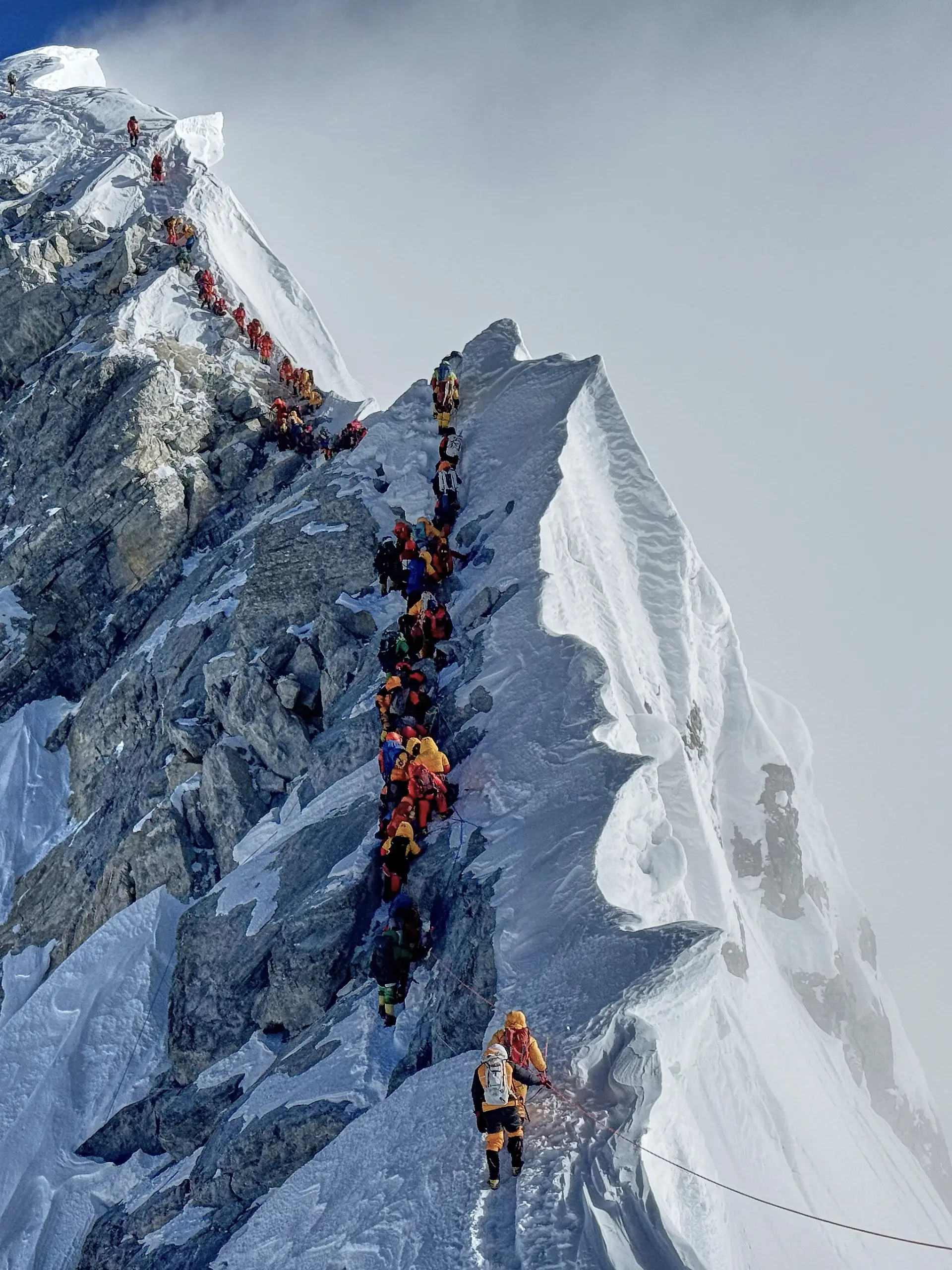 Mountaineers form a queue as they approach the summit of Mount Everest in Nepal, May 18, 2025. (AP Photo/Kunga Sherpa, File)