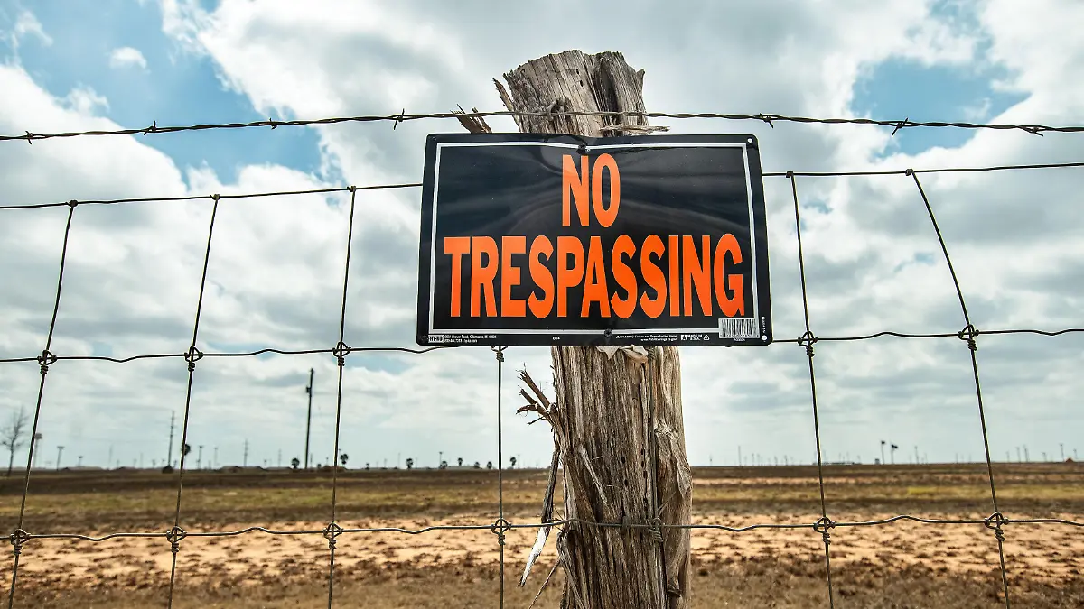 Outside the Dilley Immigration Processing Center, run by the U.S. prison-operating company, CoreCivic. Employees are stationed far back from the road to stop members of the general public from entering, on March 1, 2026, in Dilley Texas (Photo by Laura Brett/Sipa USA)