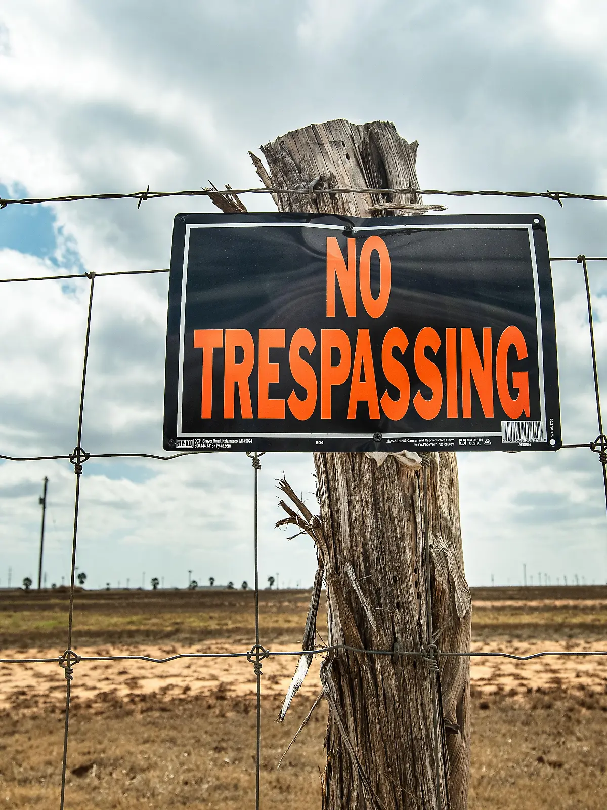 Outside the Dilley Immigration Processing Center, run by the U.S. prison-operating company, CoreCivic. Employees are stationed far back from the road to stop members of the general public from entering, on March 1, 2026, in Dilley Texas (Photo by Laura Brett/Sipa USA)