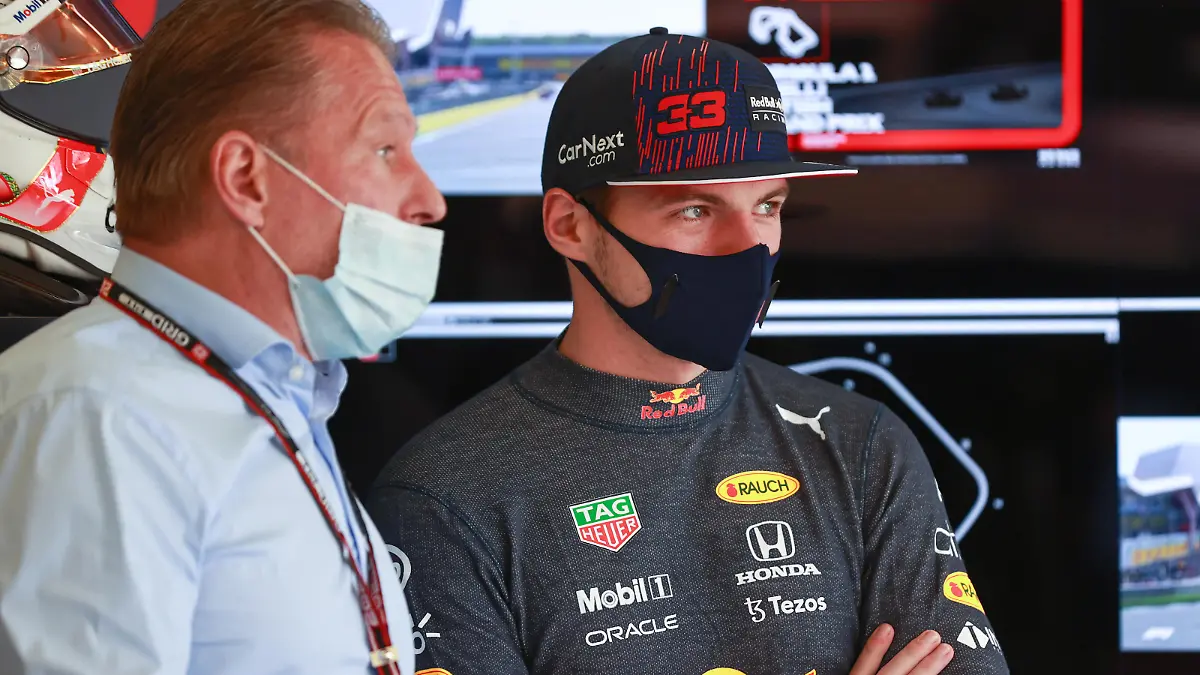 NORTHAMPTON, ENGLAND - JULY 17: Max Verstappen of Netherlands and Red Bull Racing talks with his father Jos Verstappen in the garage before the Sprint for the F1 Grand Prix of Great Britain at Silverstone on July 17, 2021 in Northampton, England. (Photo by Mark Thompson/Getty Images)