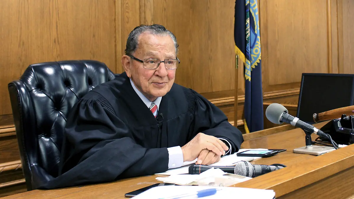 FILE - In this Aug. 10, 2017 file photo, Providence Municipal Court Judge Frank Caprio sits on the bench in Providence, R.I. The television program featuring the 81-year-old judge, who made a splash on social media, is going national. The producers of the local show "Caught in Providence" have struck a deal with FOX Television Stations to air the show in major media markets starting in the fall of 2018. (AP Photo/Michelle R. Smith, File)