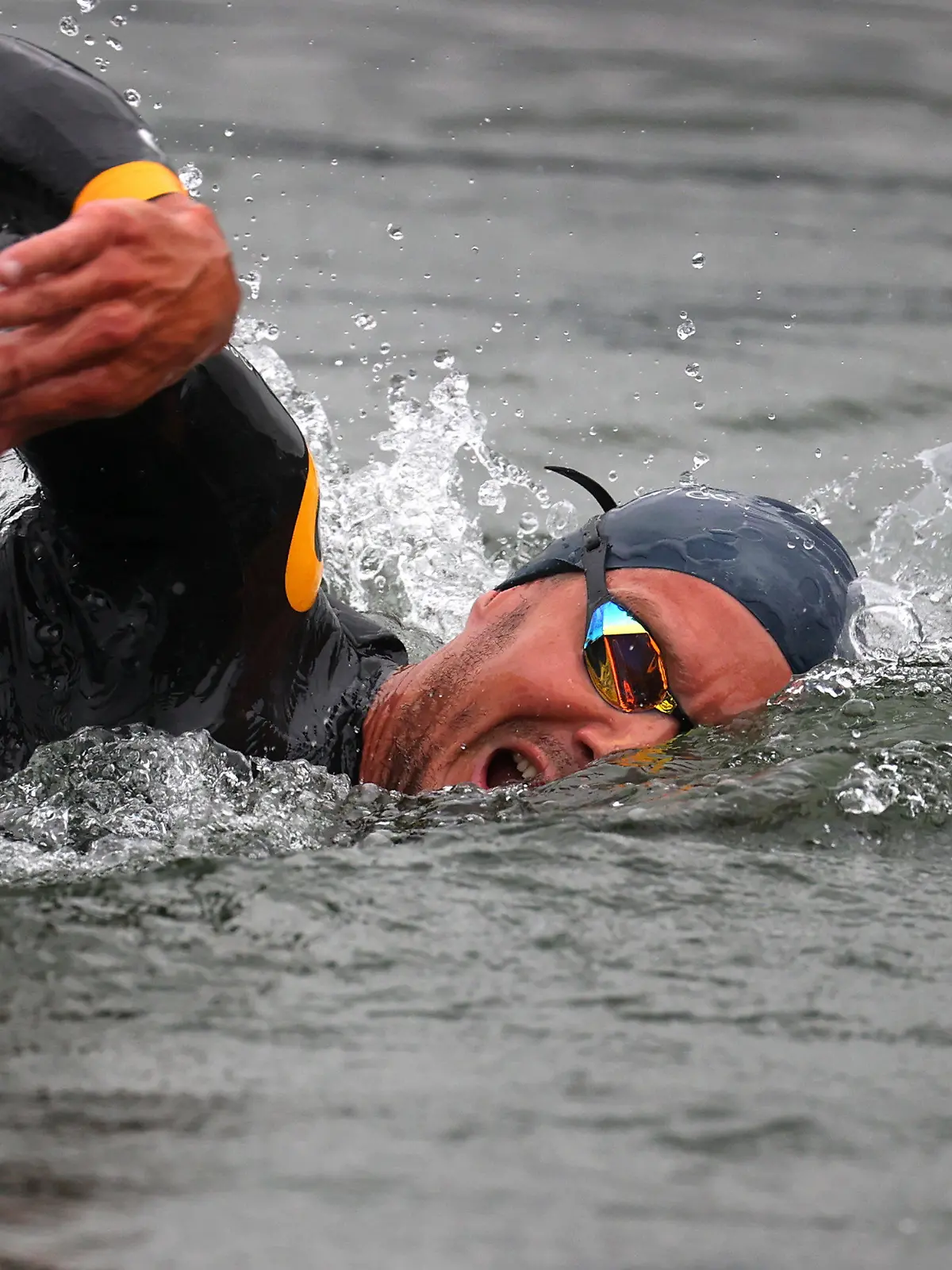 18.07.2021, Bayern, Immenstadt: Jan Frodeno, Triathlet aus Deutschland, schwimmt beim Tri Battle Royal im großen Alpsee. Foto: Karl-Josef Hildenbrand/dpa +++ dpa-Bildfunk +++