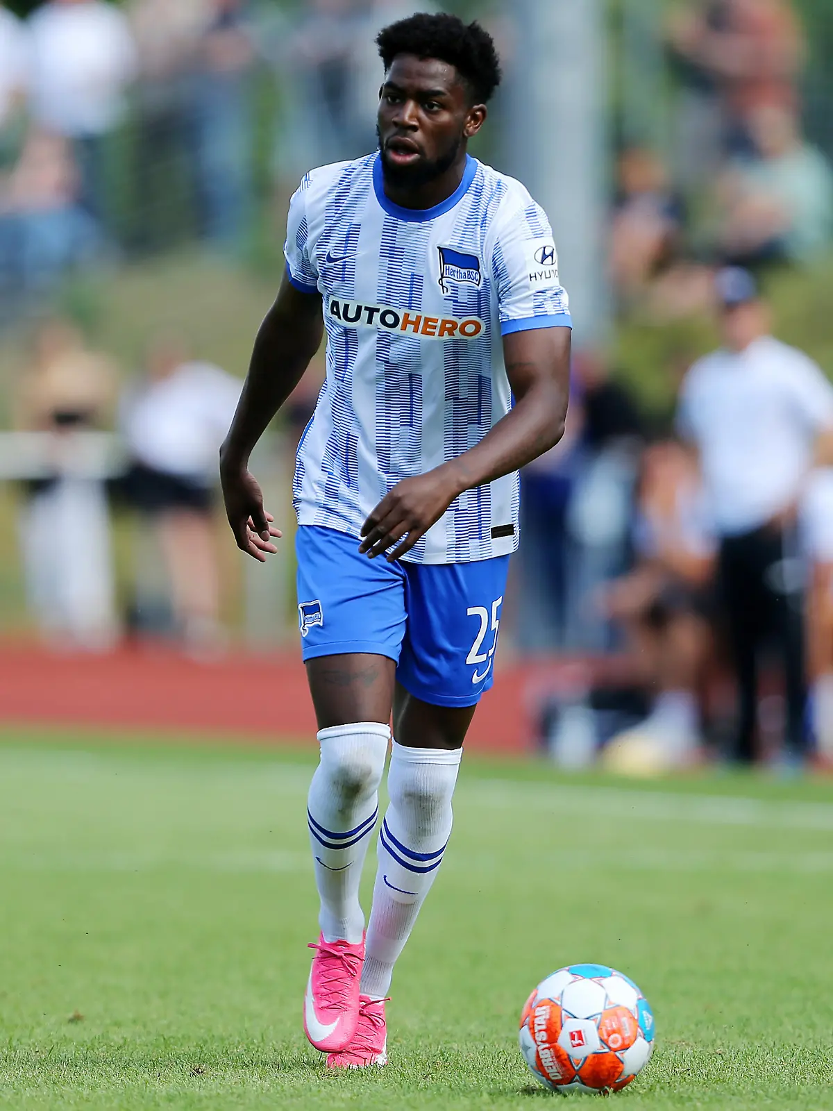 NEURUPPIN, GERMANY - JULY 07:  Jordan Torunarigha of Berlin runs with the ball during the pre-season friendly match between MSV Neuruppin and Hertha BSC at Neuruppiner Volksparkstadion on July 7, 2021 in Neuruppin, Germany.  (Photo by Matthias Kern/Getty Images)