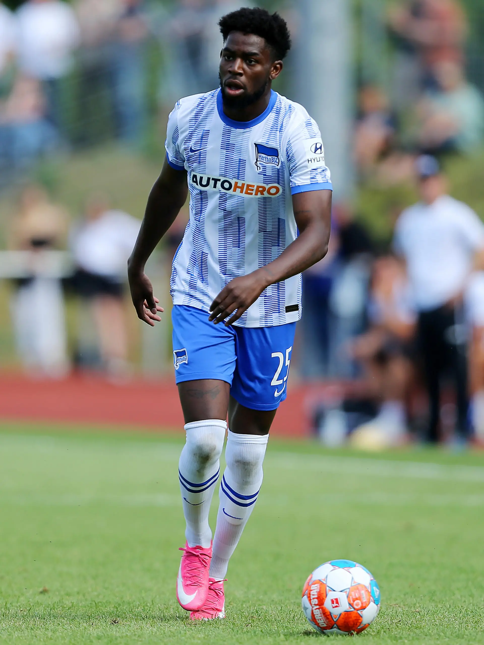 NEURUPPIN, GERMANY - JULY 07:  Jordan Torunarigha of Berlin runs with the ball during the pre-season friendly match between MSV Neuruppin and Hertha BSC at Neuruppiner Volksparkstadion on July 7, 2021 in Neuruppin, Germany.  (Photo by Matthias Kern/Getty Images)