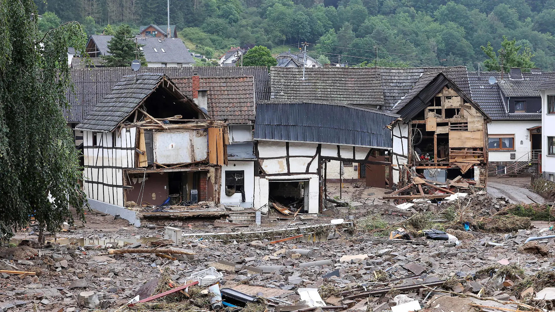 210716 -- AHRWEILER, July 16, 2021 -- Photo taken on July 16, 2021 shows roads and houses damaged in flood disaster in Schuld, a town in Ahrweiler, Germany. The death toll from the flood disaster triggered by heavy rainfall in western and southern Germany has risen to more than 100 as of Friday noon local time, according to police and local authorities. Photo by /Xinhua GERMANY-AHRWEILER-FLOODS JoachimxBywaletz PUBLICATIONxNOTxINxCHN