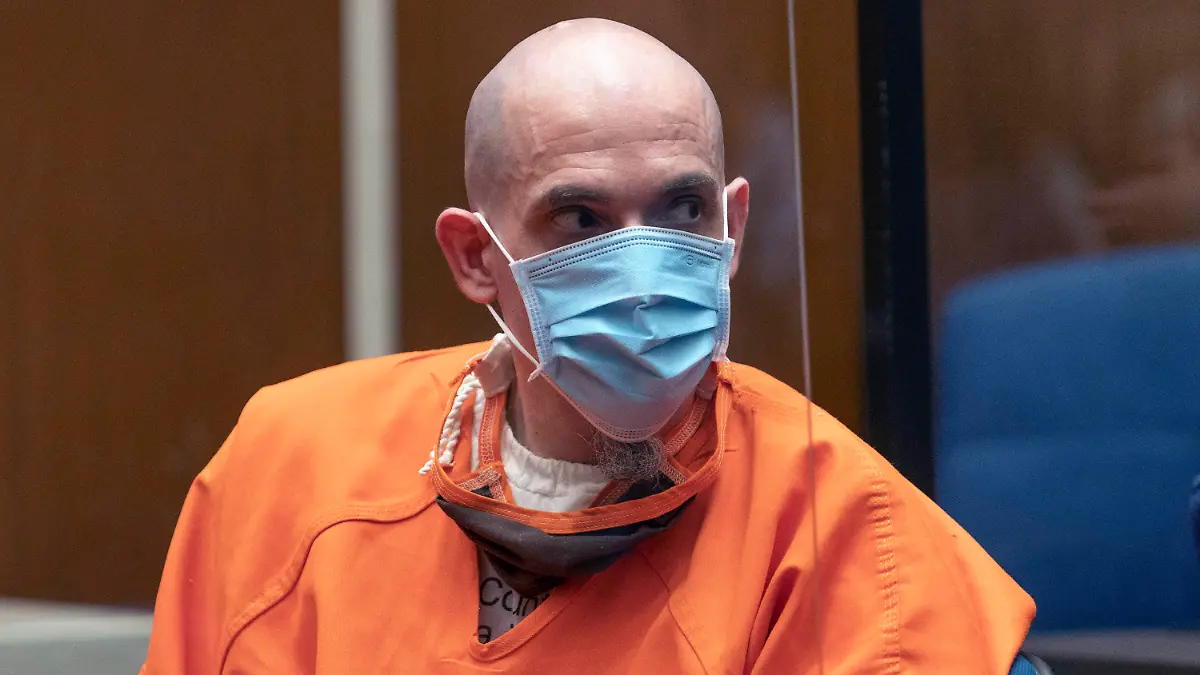 Serial killer Michael Thomas Gargiulo listens to Michael Ellerin, the father of victim Ashley Ellerin, a 22-year-old fashion design student, during a victim's statement at Gargiulo's sentencing hearing at Los Angeles Superior Court, Friday, July 16, 2021. For crimes he called “vicious and frightening,” a judge on Friday gave a death sentence to Gargiulo, a man prosecutors called “The Boy Next Door Killer” for the home-invasion murders of two women and the attempted murder of a third. (AP Photo/Damian Dovarganes)