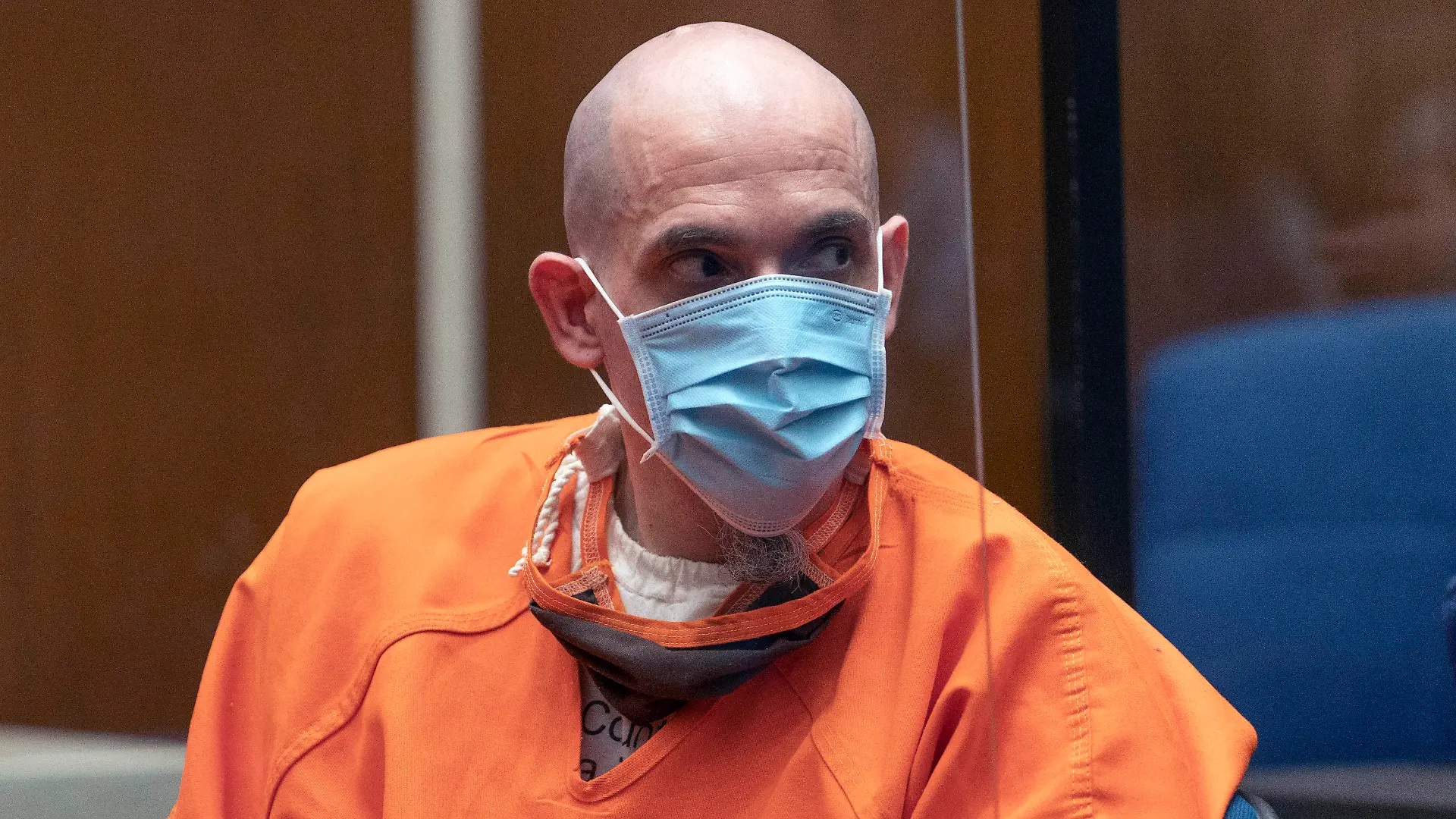 Serial killer Michael Thomas Gargiulo listens to Michael Ellerin, the father of victim Ashley Ellerin, a 22-year-old fashion design student, during a victim's statement at Gargiulo's sentencing hearing at Los Angeles Superior Court, Friday, July 16, 2021. For crimes he called “vicious and frightening,” a judge on Friday gave a death sentence to Gargiulo, a man prosecutors called “The Boy Next Door Killer” for the home-invasion murders of two women and the attempted murder of a third. (AP Photo/Damian Dovarganes)
