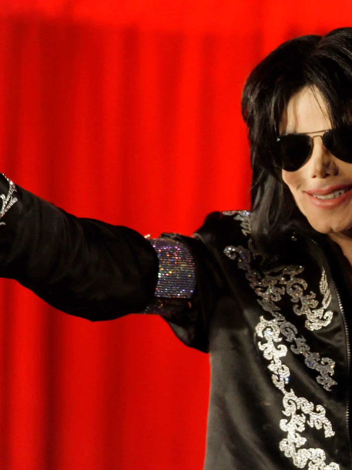 FILE - In this March 5, 2009 file photo, US singer Michael Jackson announces at a press conference that he is set to play ten live concerts at the London O2 Arena in July 2009. Wade Robson, who testified that Michael Jackson never abused him as a child, filed a claim against the singer's estate claiming years of abuse by the pop superstar. Robson claims he was abused by the pop superstar over a seven-year period. A Los Angeles judge said Thursday June 6, that he was inclined to unseal portions of Robson's court filings alleging molestation by Jackson, but that certain details wouldn't be made public to protect the choreographer's privacy. (AP Photo/Joel Ryan, File)