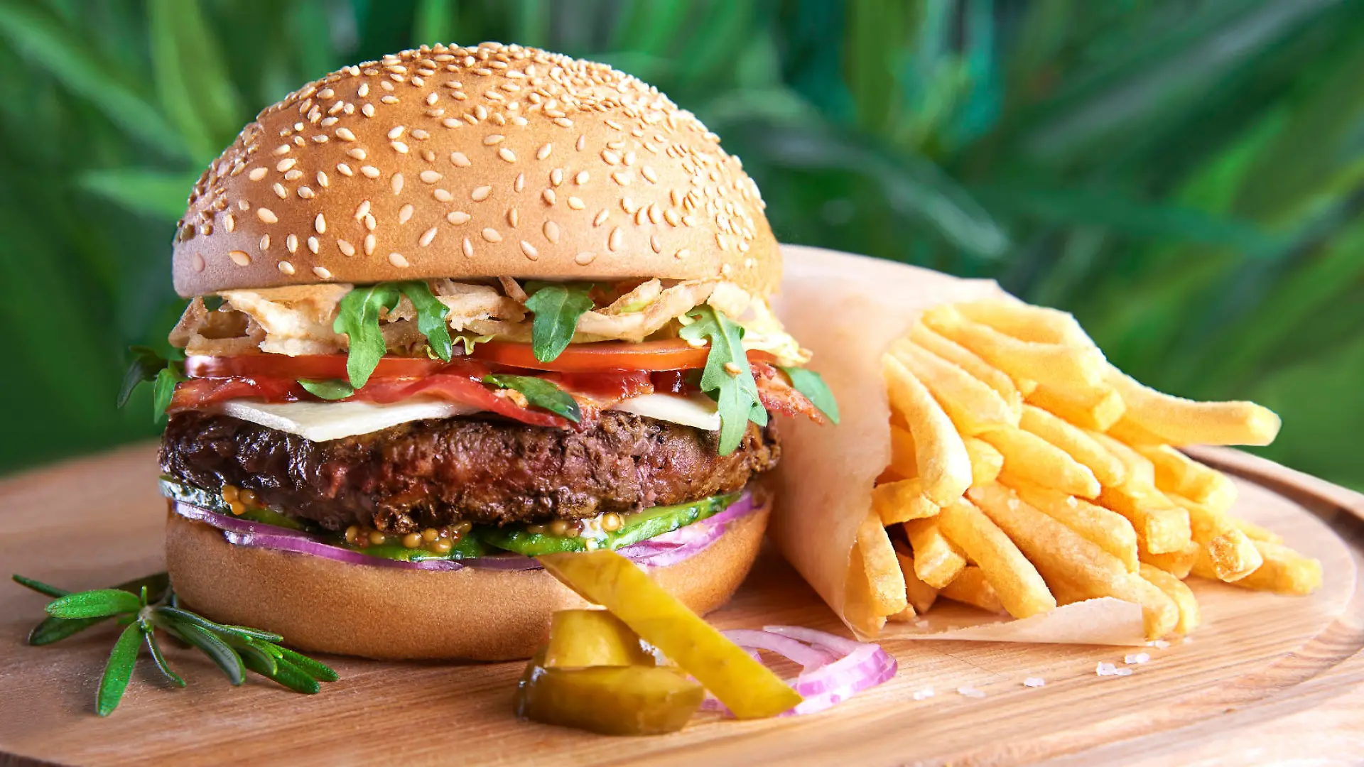 Tasty hamburger and french fries