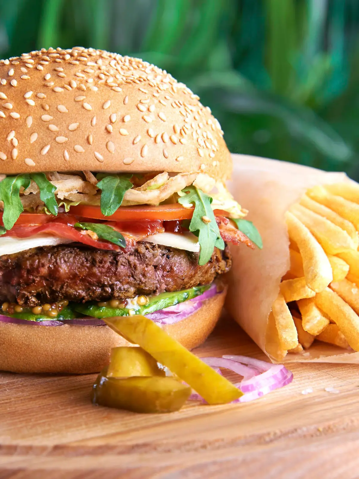 Tasty hamburger and french fries 