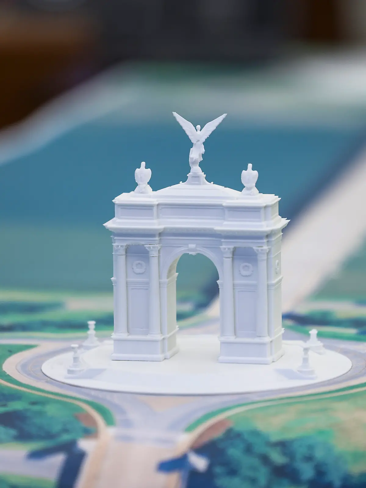 A model of the Triumph Arch across the Memorial Bridge from the Lincoln Memorial is seen on the Resolute Desk as President Donald Trump responds to a question from the news media during a press conference in the Oval Office of the White House in Washington, DC on Wednesday, October 15, 2025. President Trump announced the results of Operation Summer Heat, a federal nationwide violent crime reduction operation. Photo by Jim Lo Scalzo/UPI Photo via Newscom picture alliance