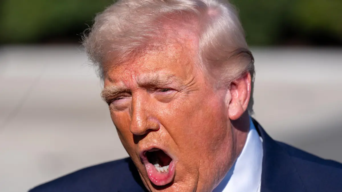 President Donald Trump speaks to the media before departing on Marine One from the South Lawn of the White House. (Photo by Jen Golbeck / SOPA Images/Sipa USA)