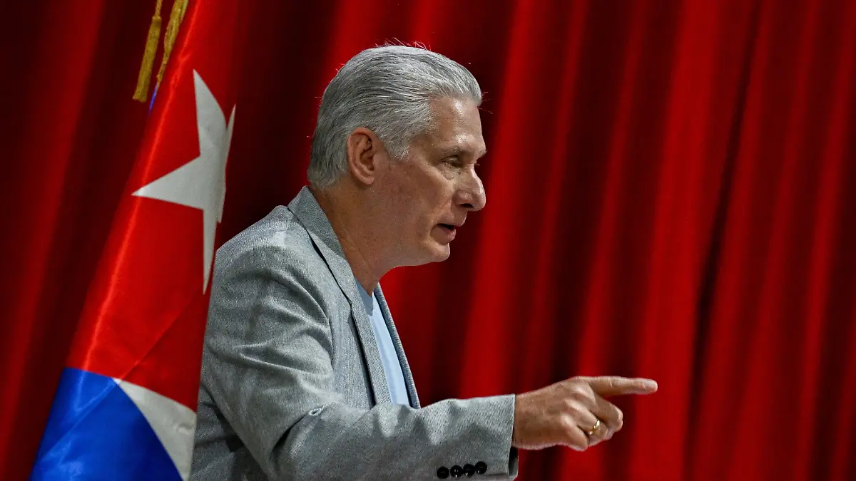 Cuban President Miguel Diaz-Canel delivers a welcome speech to participants of the "Nuestra America," or Our America Convoy at the Convention Palace in Havana, Cuba, Friday, March 20, 2026.(Adalberto Roque/Pool Photo via AP)