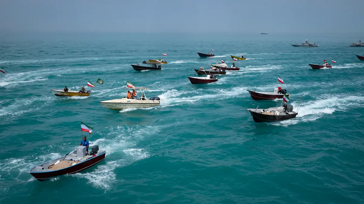 Basij paramilitary force speed boats are sailing along the Persian Gulf during the Islamic Revolutionary Guard Corps (IRGC) marine parade to commemorate Persian Gulf National Day, near the Bushehr nuclear power plant in the seaport city of Bushehr, Bushehr province, in the south of Iran, on April 29, 2024. Persian Gulf National Day, which celebrates the expulsion of the Portuguese from the Strait of Hormuz and the Persian Gulf in 1622 by the Safavid forces led by Imam Quli Khan under the command of Shah Abbas I, is observed on the 10th of Ordibehesht in the Iranian calendar, typically falling in late April or early May. (Photo by Morteza Nikoubazl/NurPhoto)