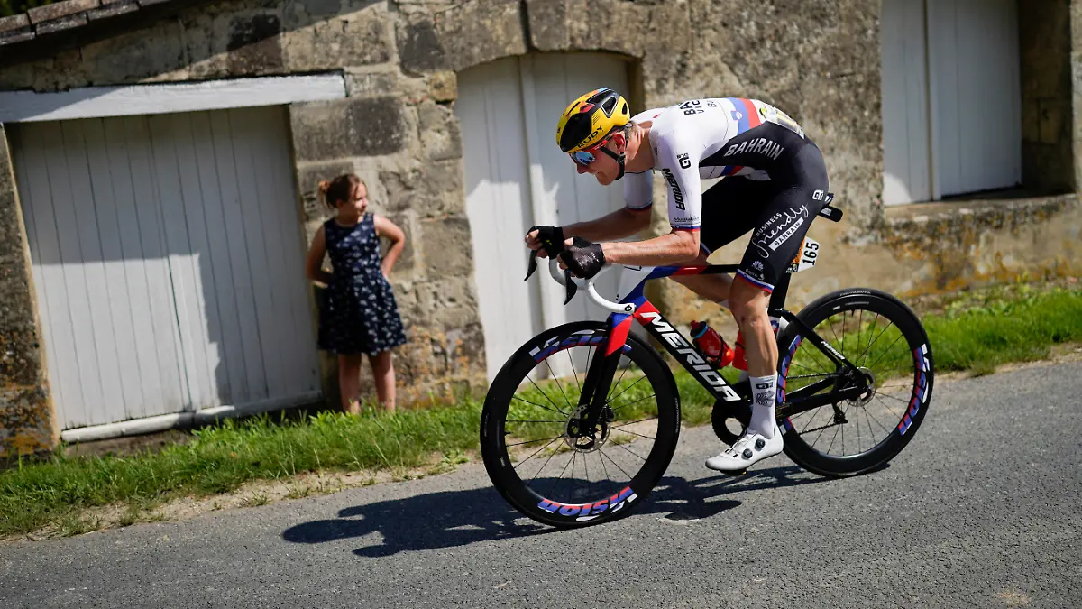 Stage winner Slovenia's Matej Mohoric breaks away during the nineteenth stage of the Tour de France cycling race over 207 kilometers (128.6 miles) with start in Mourenx and finish in Libourne, France,Friday, July 16, 2021. (AP Photo/Daniel Cole)