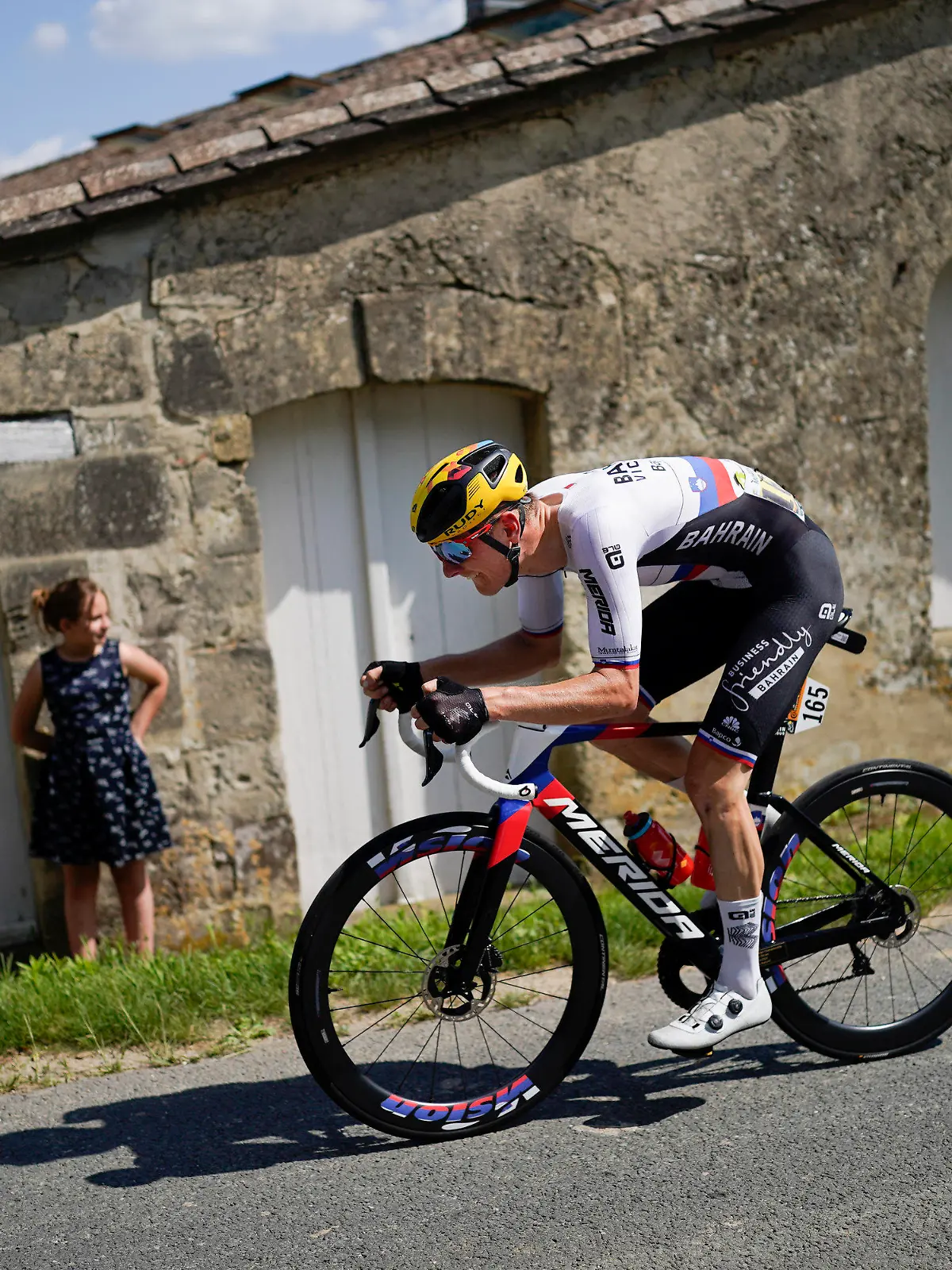 Stage winner Slovenia's Matej Mohoric breaks away during the nineteenth stage of the Tour de France cycling race over 207 kilometers (128.6 miles) with start in Mourenx and finish in Libourne, France,Friday, July 16, 2021. (AP Photo/Daniel Cole)