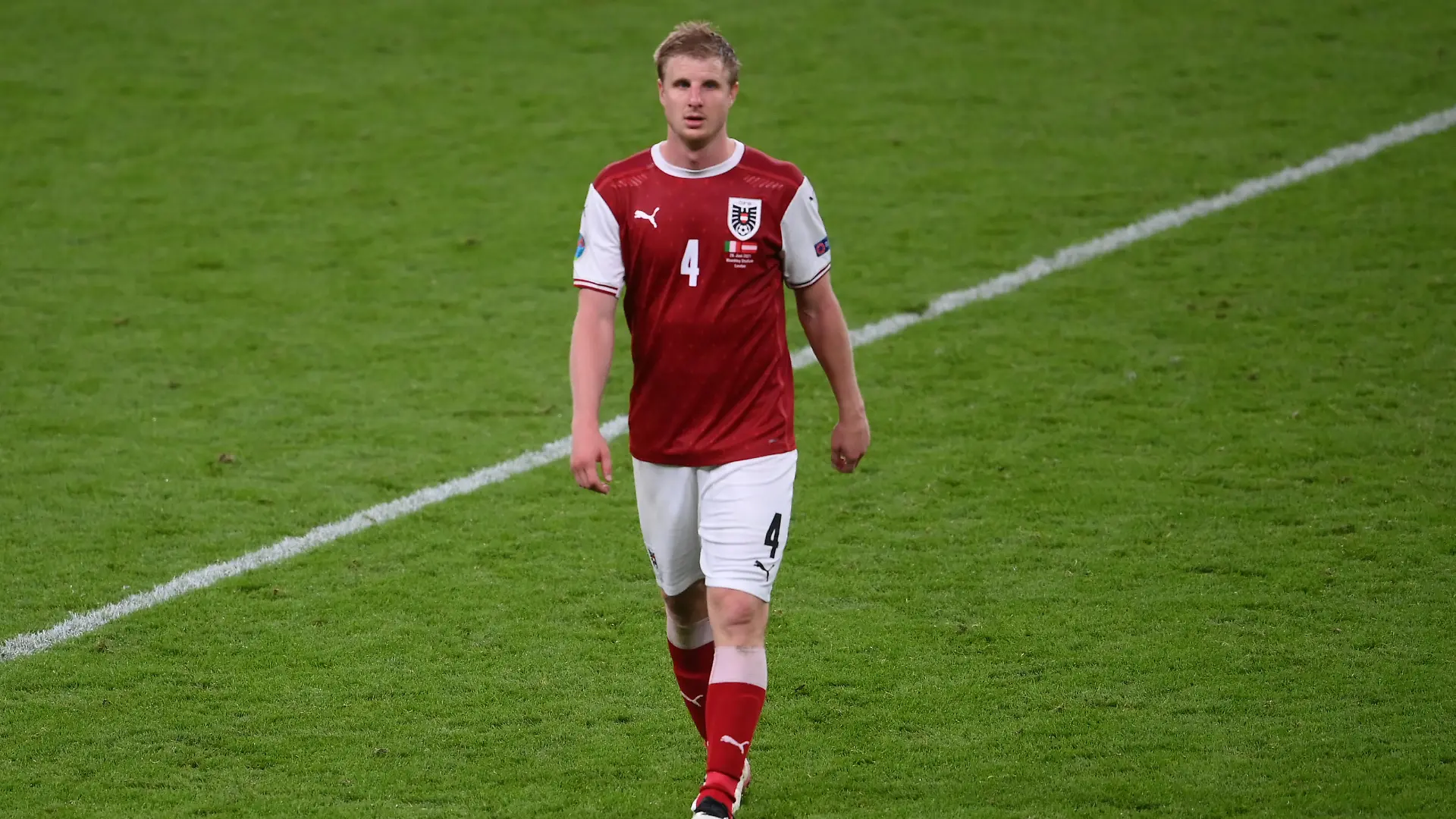 Soccer Football - Euro 2020 - Round of 16 - Italy v Austria - Wembley Stadium, London, Britain - June 26, 2021 Austria's Martin Hinteregger looks dejected after the match Pool via REUTERS/Laurence Griffiths