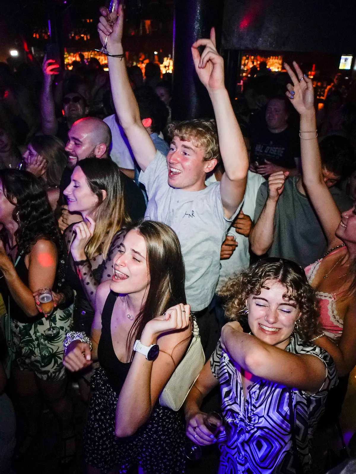 People react on the dance floor shortly after the reopening, at The Piano Works in Farringdon, in London, Monday, July 19, 2021. Thousands of young people plan to dance the night away at 'Freedom Day' parties after midnight Sunday, when almost all coronavirus restrictions in England are to be scrapped. Nightclubs, which have been shuttered since March 2020, can finally reopen. (AP Photo/Alberto Pezzali)