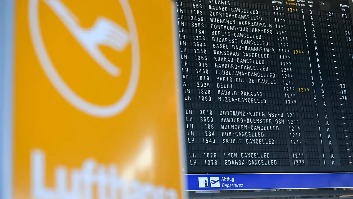 A flight board displays information of numerous cancelled flights, during a strike by the UFO union, representing Lufthansa cabin crew, at Frankfurt Airport, Germany, April 15, 2026. REUTERS/Jana Rodenbusch