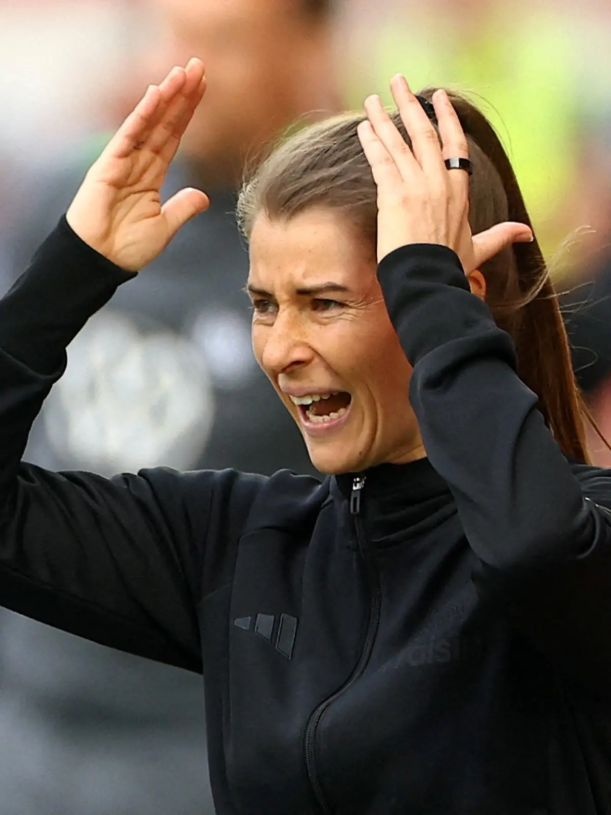 Soccer Football - Bundesliga - 1. FC Union Berlin v VfL Wolfsburg - Stadion An der Alten Forsterei, Berlin, Germany - April 18, 2026  1. FC Union Berlin interim coach Marie-Louise Eta reacts REUTERS/Lisi Niesner DFL REGULATIONS PROHIBIT ANY USE OF PHOTOGRAPHS AS IMAGE SEQUENCES AND/OR QUASI-VIDEO.     TPX IMAGES OF THE DAY