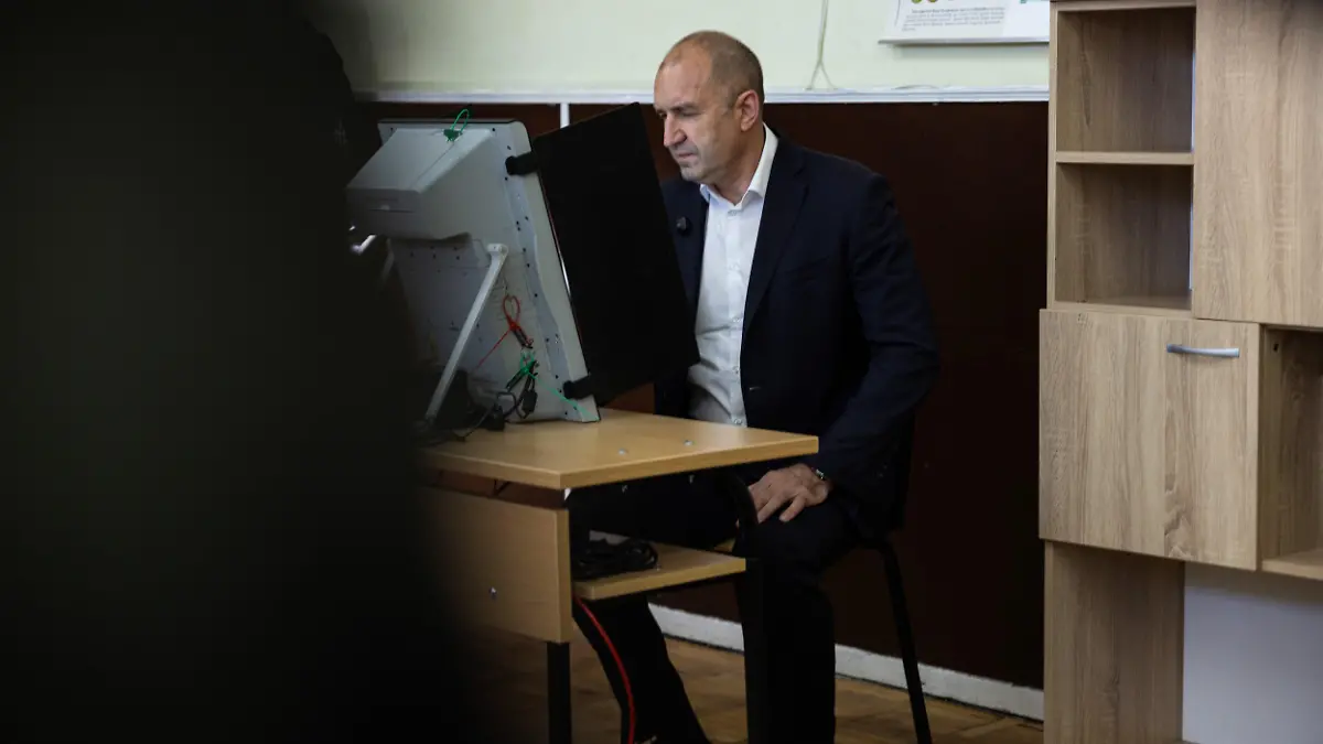 Bulgarian President Rumen Radev votes using a voting machine at a polling station in Sofia, Bulgaria on April 19, 2026. The event marks the parliamentary elections held to elect members of the National Assembly amid ongoing political instability.