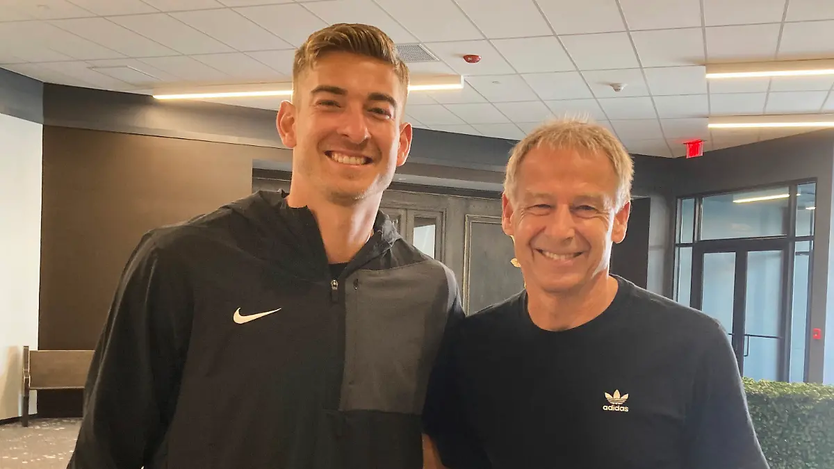 United States’ men’s national team soccer player Jonathan Klinsmann, left, and his father Juergen Klinsmann pose