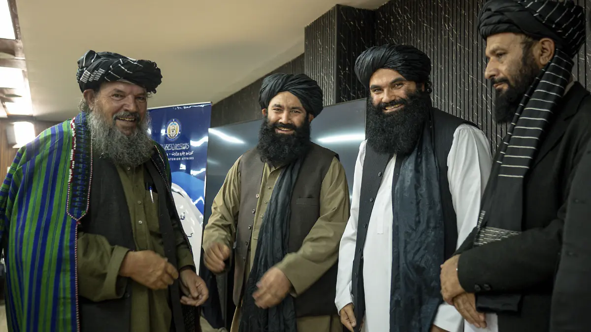 From right to left, Mawlawi Hamdullah Naumani, Minister of Communications and Information Technology, Sirajuddin Haqqani, the Talibans acting Interior Minister, Mullah Mohammad Younis Akhundzada, Minister of Rural Rehabilitation and Development, and another Taliban official stand on a stage During a ceremony in Kabul, Afghanistan on December 28, 2025. The ceremony honors Kabul Mayor Mawlawi Abdul Rashid Baluch for his work on urban development projects in the capital. Organized by the Talibans acting Interior Minister Sirajuddin Haqqani, the event is attended by several senior officials and cabinet members. Baluch is awarded a certificate of appreciation, and a traditional Afghan turban is placed on his head as a symbolic gesture of respect at the conclusion of the ceremony.//MIDDLEEASTIMAGES_mei0777/Credit:Javid Ashna/MEI/SIPA/2512300912