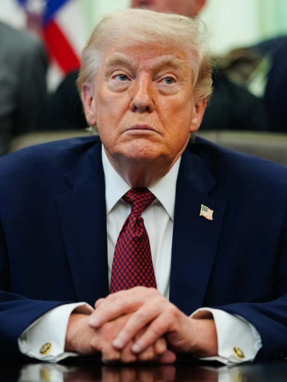 President Donald Trump listens in the Oval Office of the White House, Saturday, April 18, 2026, in Washington. (AP Photo/Julia Demaree Nikhinson)