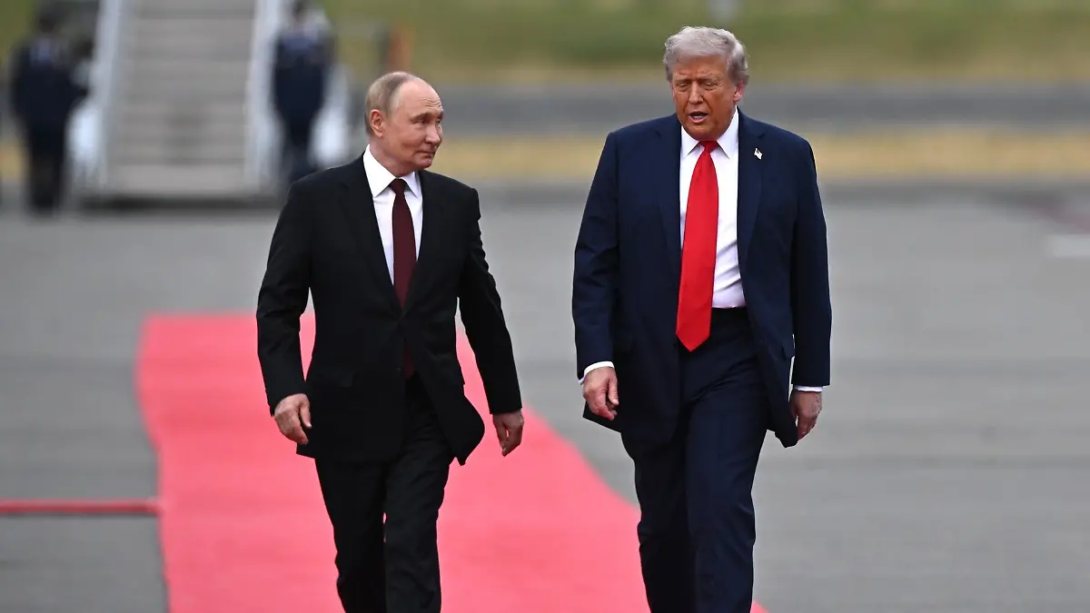 U.S. President Donald Trump met with Russian President Vladimir Putin during a high-stakes summit on Friday August 15, 2025 at the Joint Base Elmendorf-Richardson in Anchorage, Alaska. The two world leaders earlier shook hands as they disembarked from their planes and then stepped on a red carpet together and posed for a photo. As Trump and Putin met on the tarmac in Alaska, a flyover of American military planes passed overhead, including fighter jets and what appeared to be a B-2 stealth bomber. Putin then joined Trump in his presidential limo as they departed the tarmac and headed to their bilateral meeting. (Kremlin handout via EYEPRESS) Photo via Newscom picture alliance