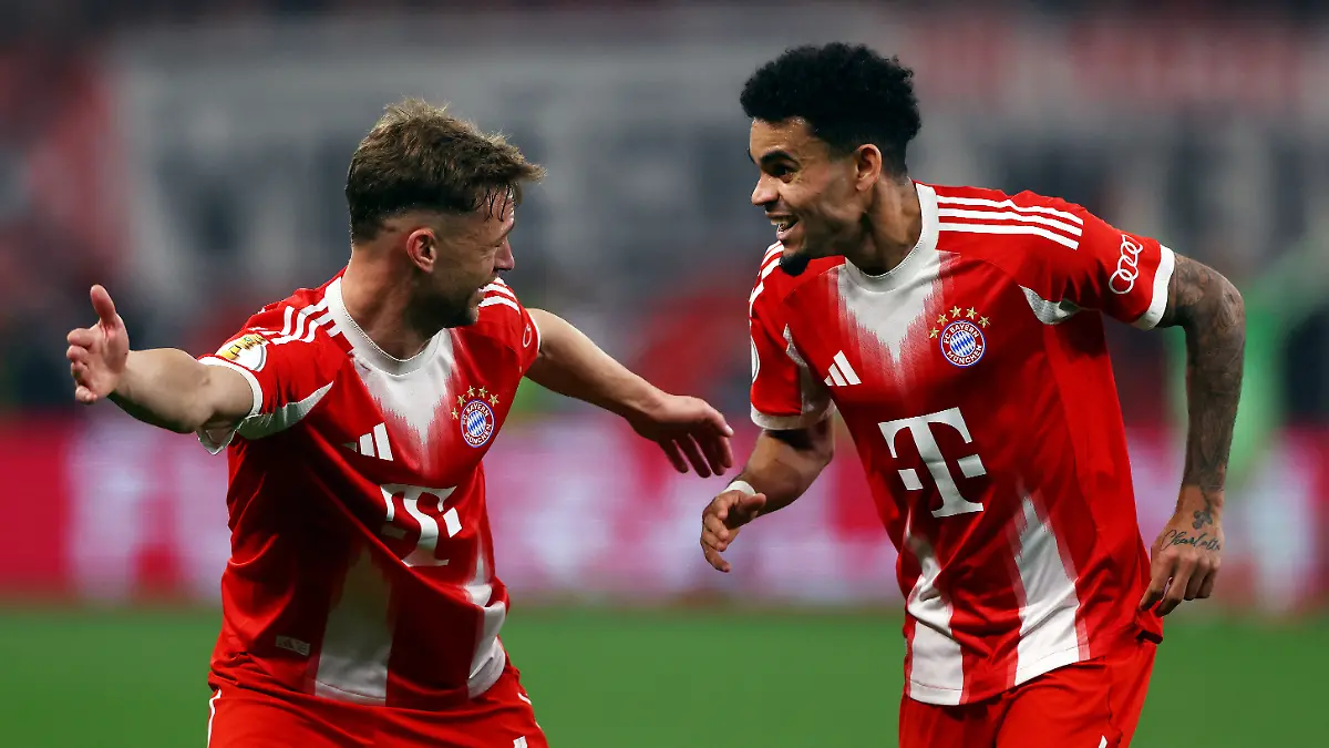 Soccer Football - DFB Cup - Semi Final - Bayer Leverkusen v Bayern Munich - BayArena, Leverkusen, Germany - April 22, 2026  Bayern Munich's Luis Diaz celebrates scoring their second goal with Bayern Munich's Joshua Kimmich REUTERS/Thilo Schmuelgen DFB REGULATIONS PROHIBIT ANY USE OF PHOTOGRAPHS AS IMAGE SEQUENCES AND/OR QUASI-VIDEO.