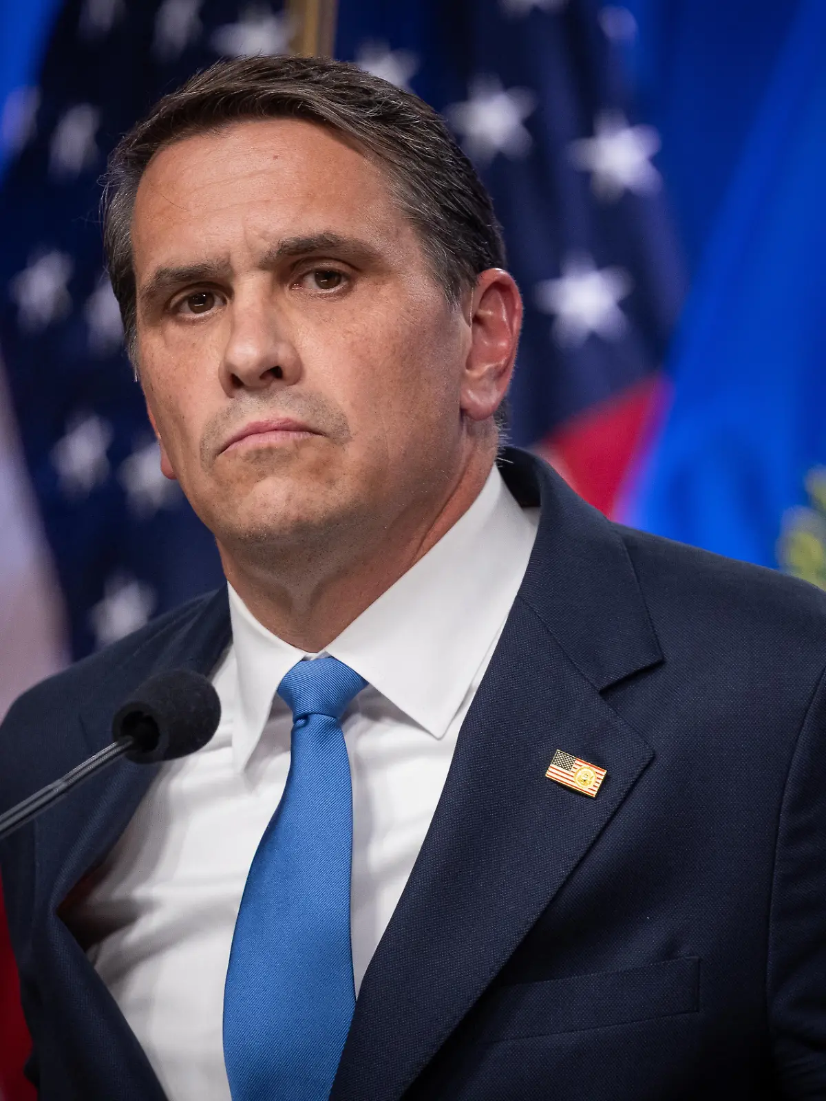 WASHINGTON, DC - APRIL 21: Acting Attorney General Todd Blanche is seen at a press conference with FBI Director Kash Patel following the indictment of the Southern Poverty Law Center for money laundering, at the Department of Justice in Washington, DC on April 21, 2026. Nathan Posner / Anadolu