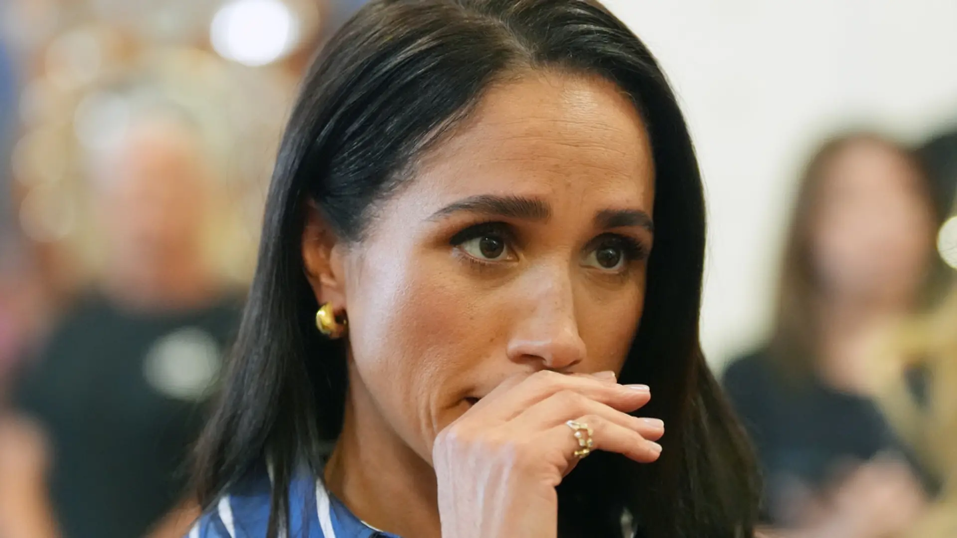 Meghan Markle, the Duchess of Sussex, meets volunteer first responders from the Bondi Surf Bathers' Life Saving Club during a visit to Bondi Beach, Australia, Friday, April 17, 2026. (Jonathan Brady/Pool Photo via AP)